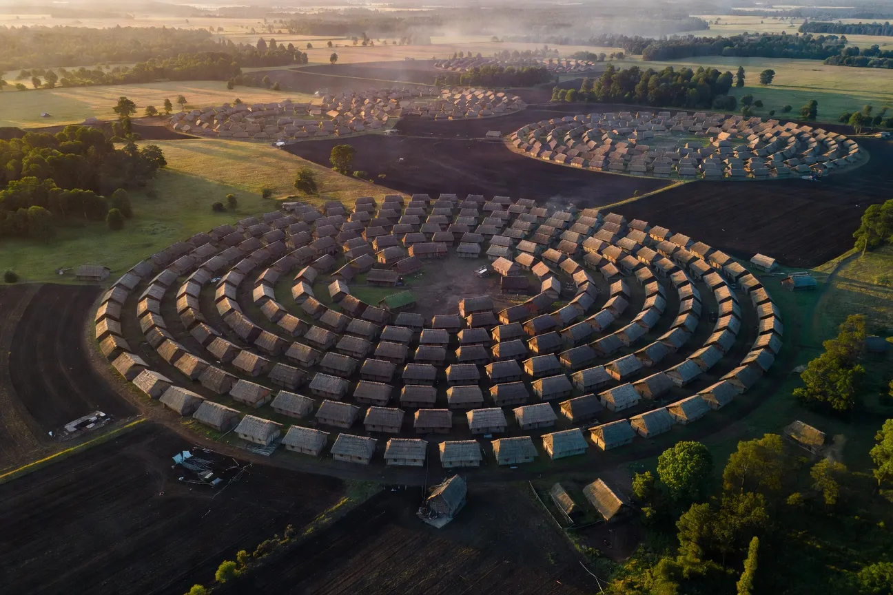 Aerial reconstruction of Talianki mega-settlement, central Ukraine, 4000 BC, 15000 inhabitants, circular layout, surrounded by black soil farmland